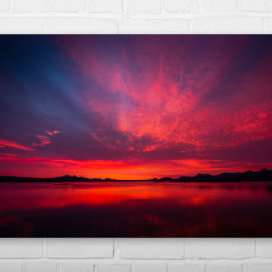 Lake Havasu City Sunrise wall art 36 inches on metal print with interior of modern living room with chair 3D rendering